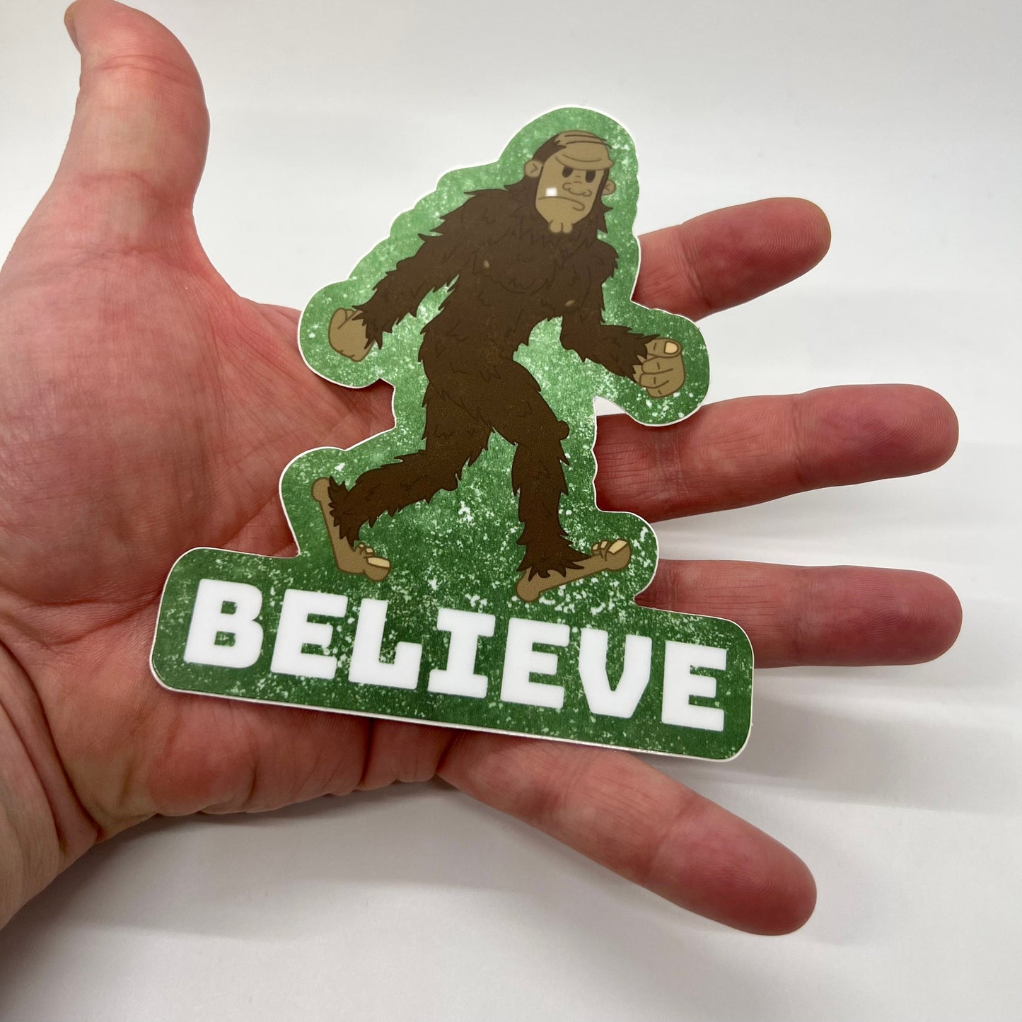 Funny Decal Stickers — Believe. Bigfoot sticker (Approx 4 inch × 5 inch and waterproof). For cars, windows, laptops, water bottle